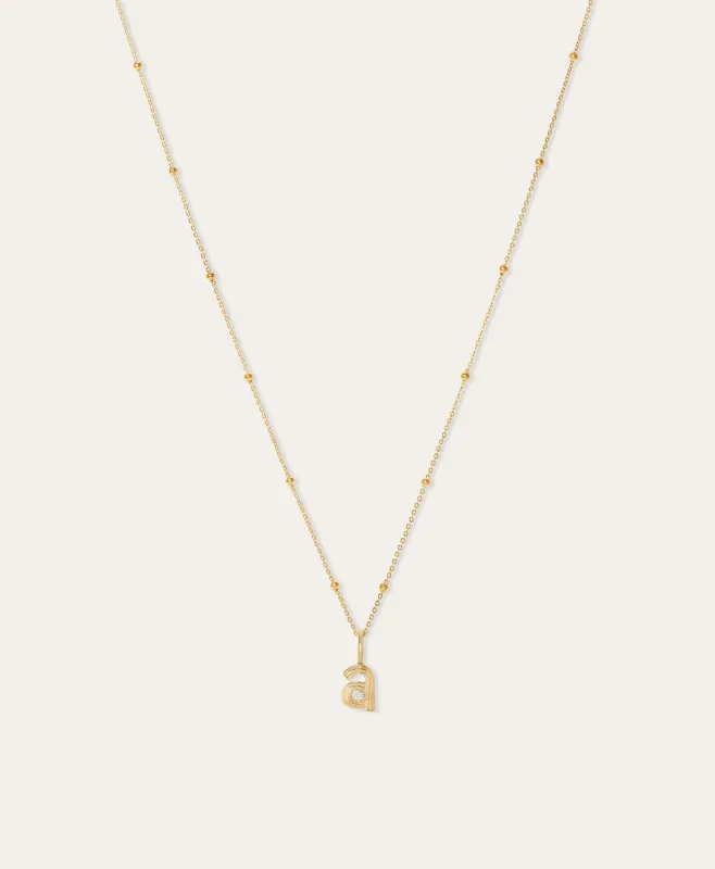 Groovy Initial Mini Charm Necklace on Saturn Chain sold by Adina Reyter