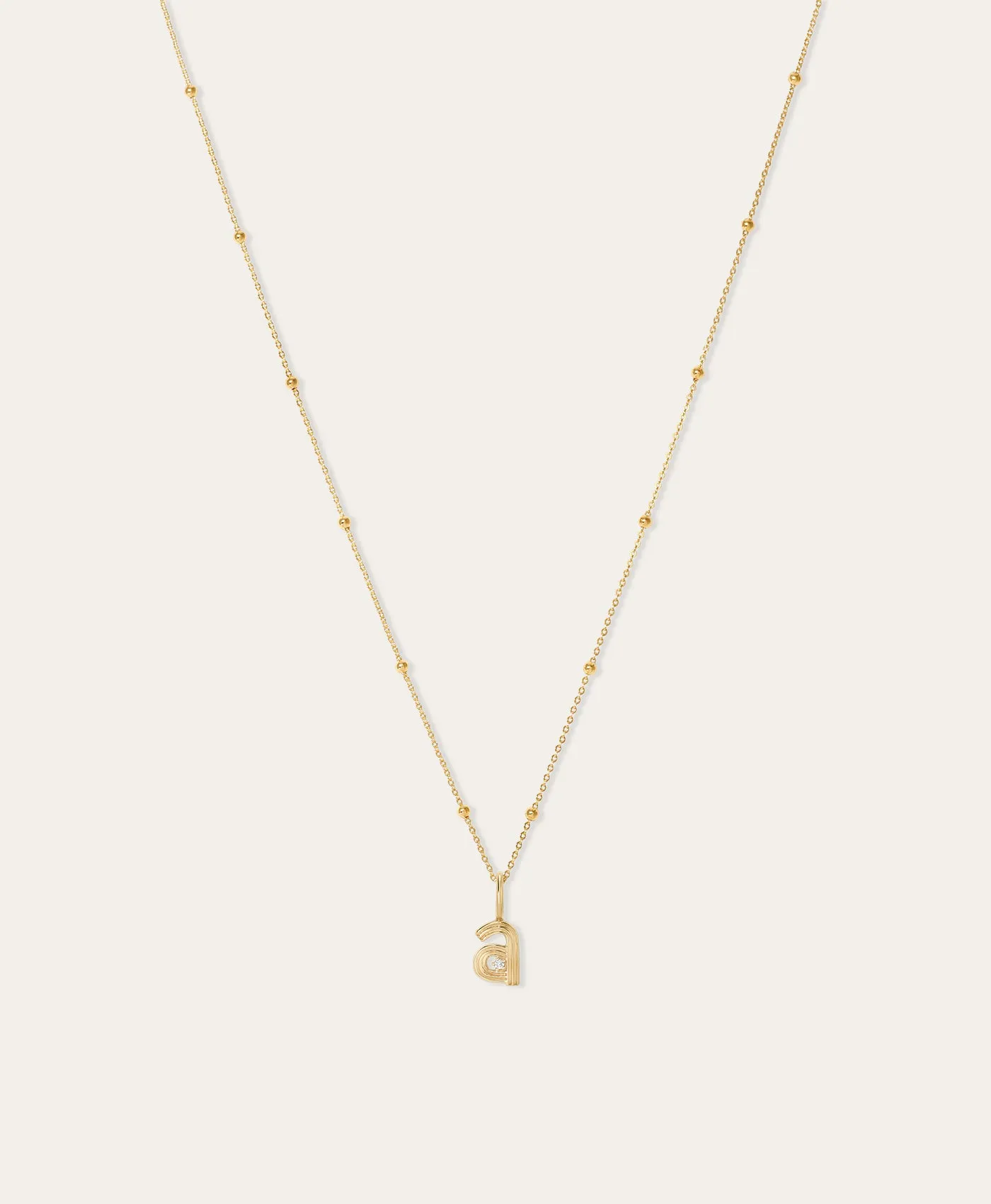 Groovy Initial Mini Charm Necklace on Saturn Chain sold by Adina Reyter