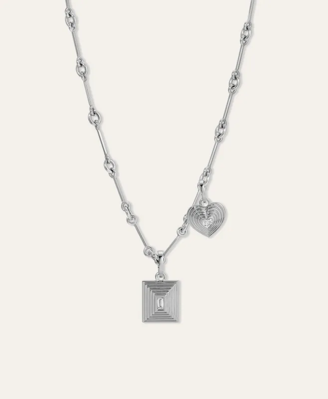 In The Groovy Diamond Charm Necklace made by Adina Reyter