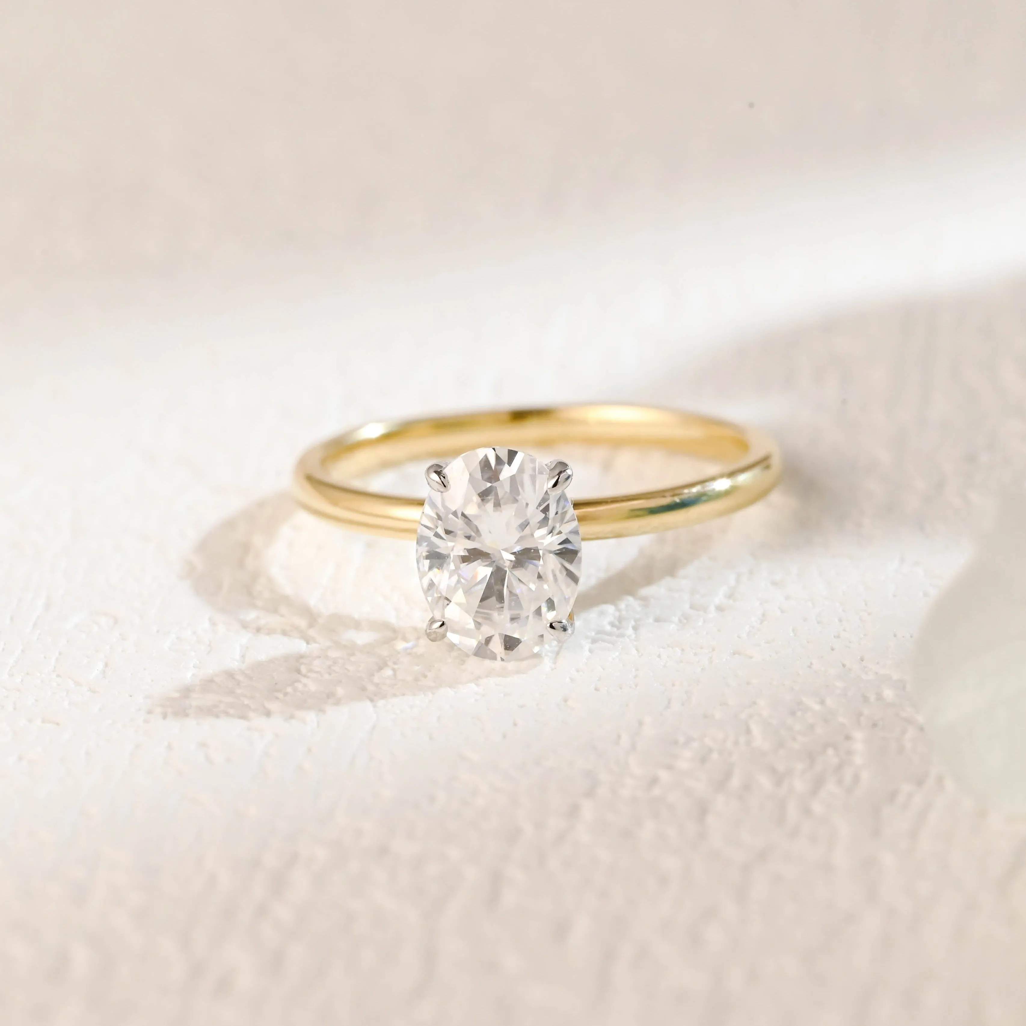 Solid Gold Two Tone Hidden Halo Oval Cut Moissanite Engagement Ring sold by Causyou