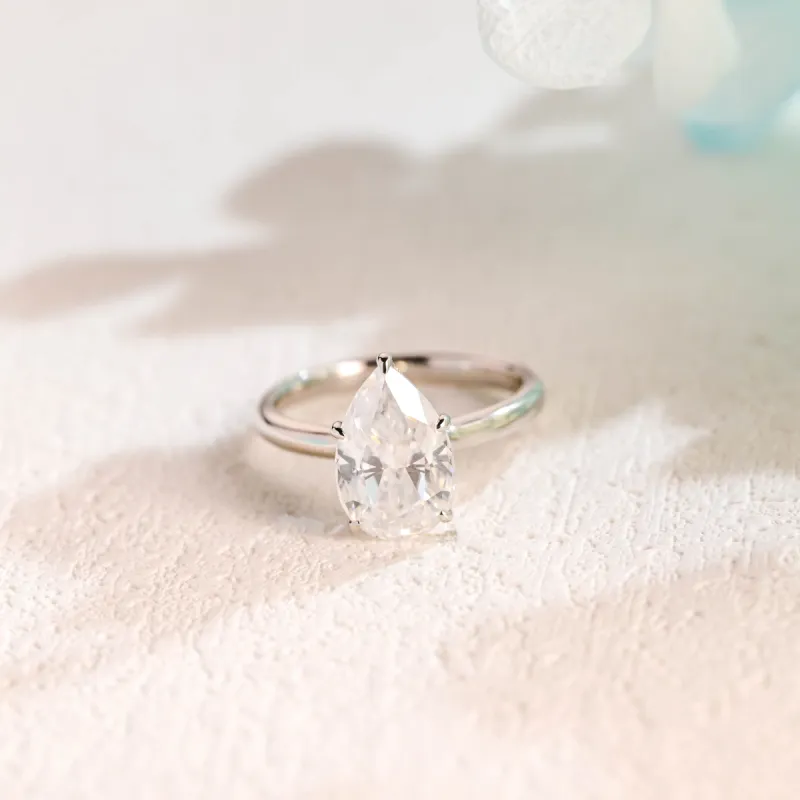 Solid Gold Pear Cut Moissanite Engagement Ring Hidden Halo sold by Causyou