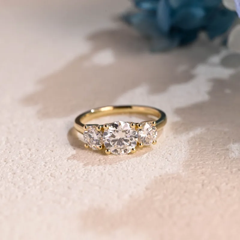 Solid Gold Three Stone Round Cut Moissanite Engagement Ring sold by Causyou
