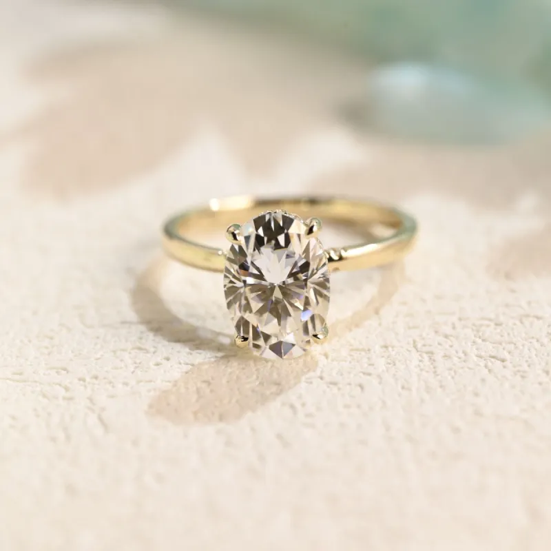 Solid Gold Oval Cut Moissanite Engagement Ring Hidden Halo sold by Causyou