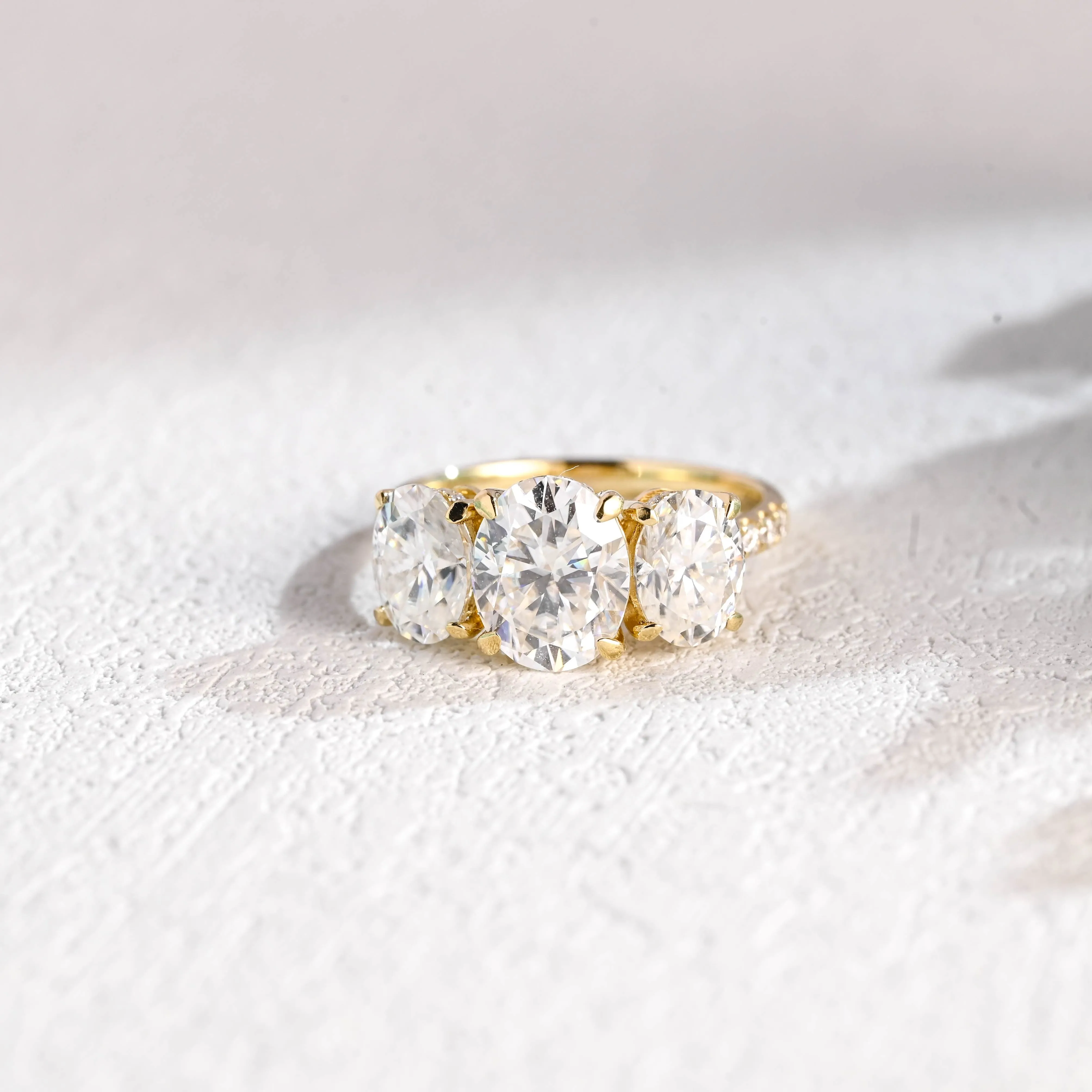 Solid Gold Hidden Halo Three Stone Oval Moissanite Engagement Ring sold by Causyou