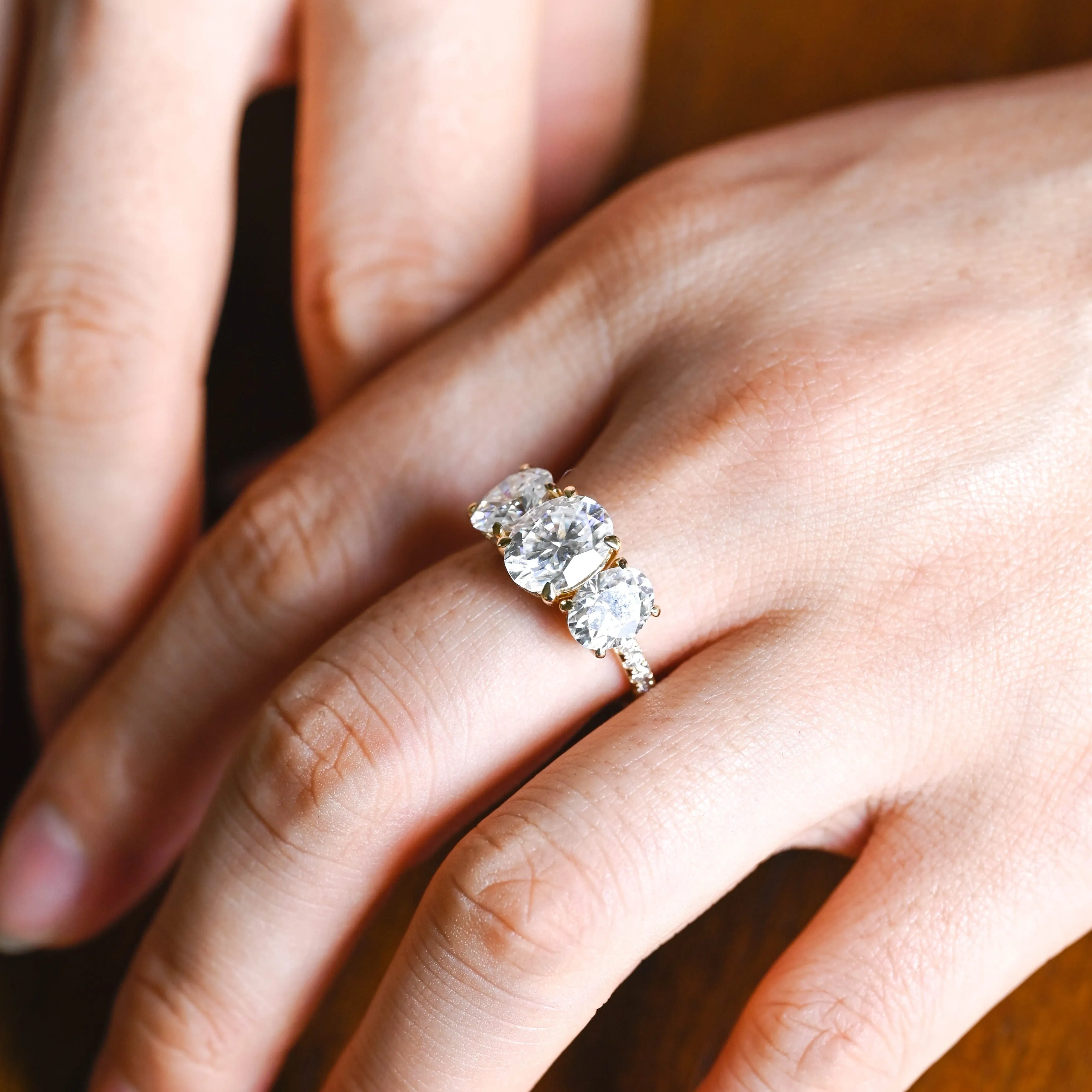 Solid Gold Hidden Halo Three Stone Oval Moissanite Engagement Ring sold by Causyou product image thumbnail 2