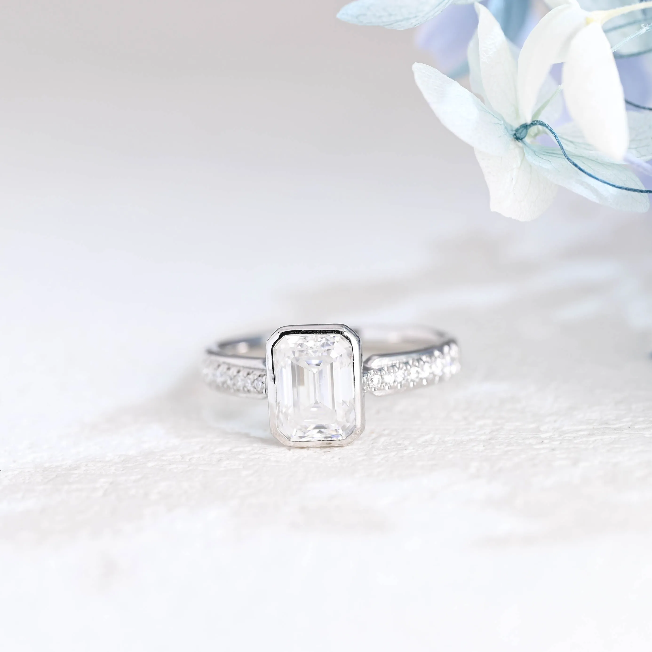Solid Gold Bezel Half Eternity Emerald Cut Moissanite Engagement Ring sold by Causyou