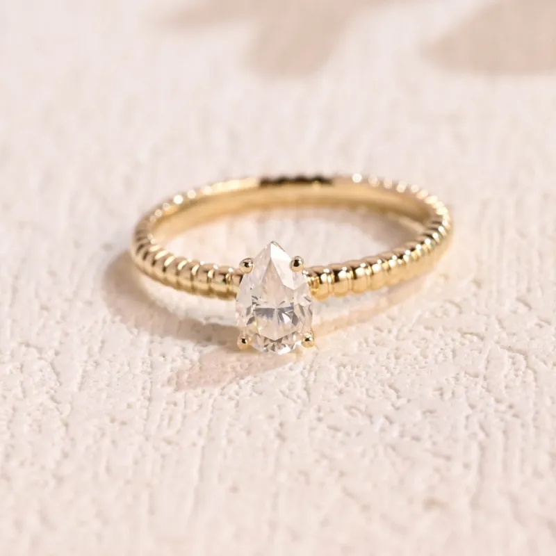 Solid Gold Solitaire Pear Cut Moissanite Engagement Ring sold by Causyou