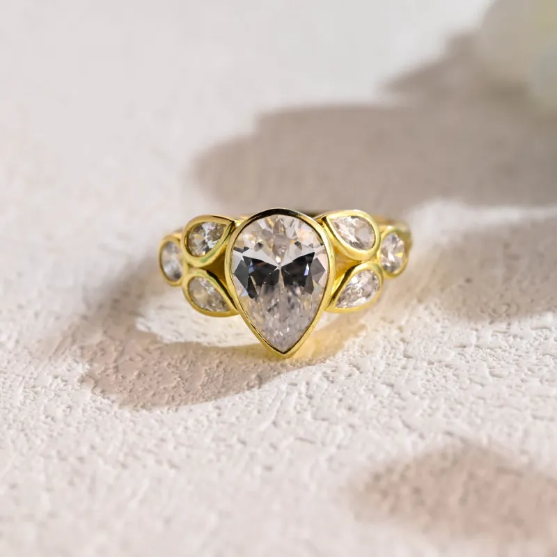 Solid Gold Bezel Pear Cut Moissanite Engagement Ring sold by Causyou