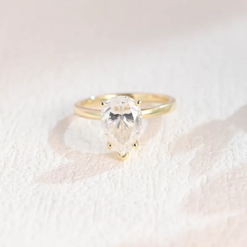 Solid Gold Solitaire Pear Cut Moissanite Engagement Ring sold by Causyou