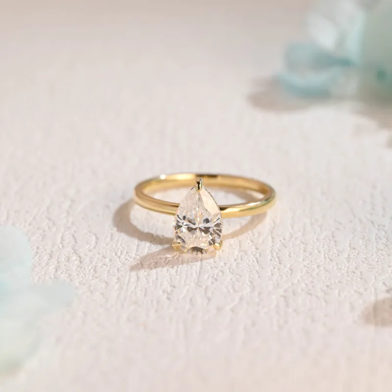 Solid Gold Hidden Halo Pear Cut Moissanite Engagement Ring sold by Causyou