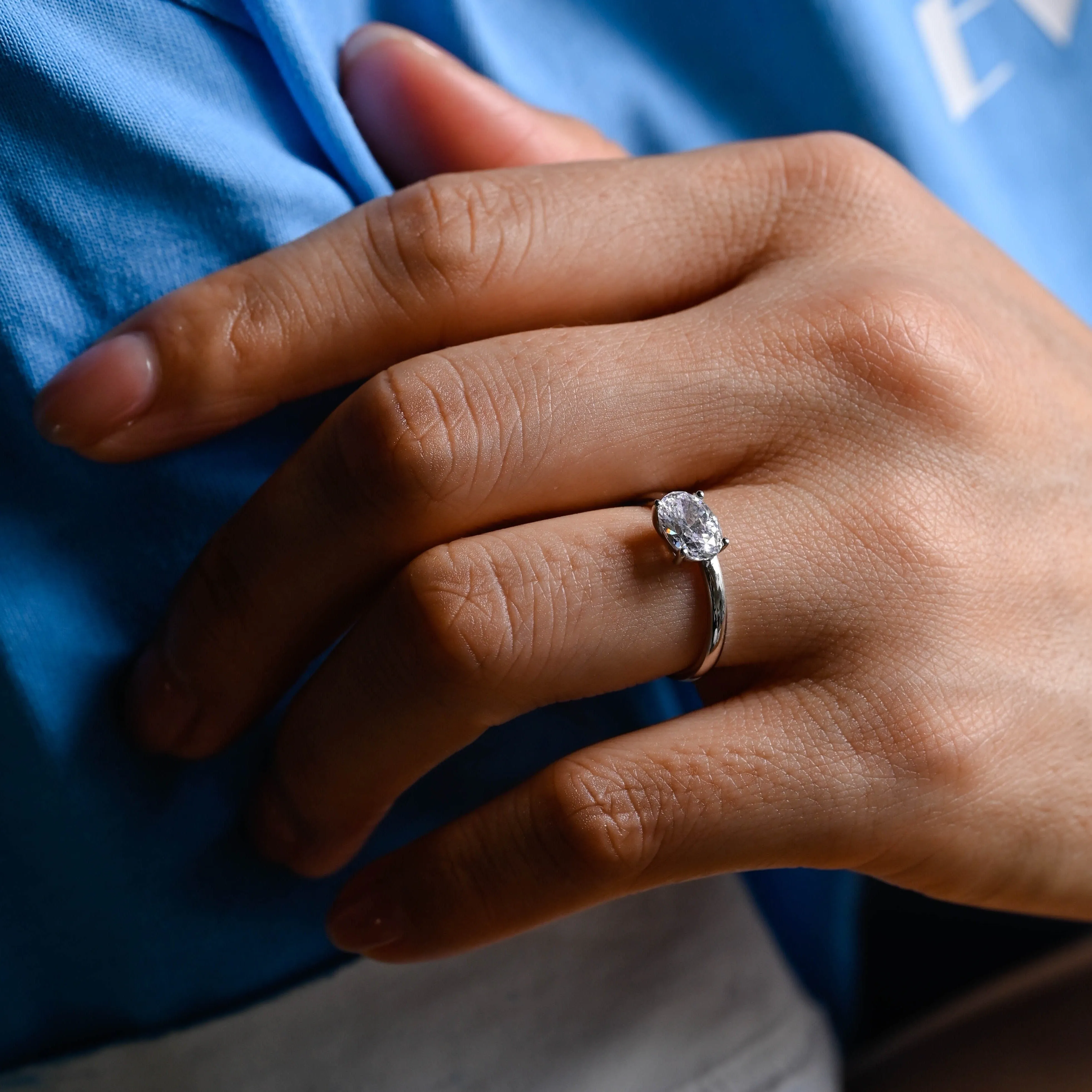 East to West Solid Gold Off Side Oval Cut Moissanite Engagement Ring sold by Causyou product image thumbnail 4