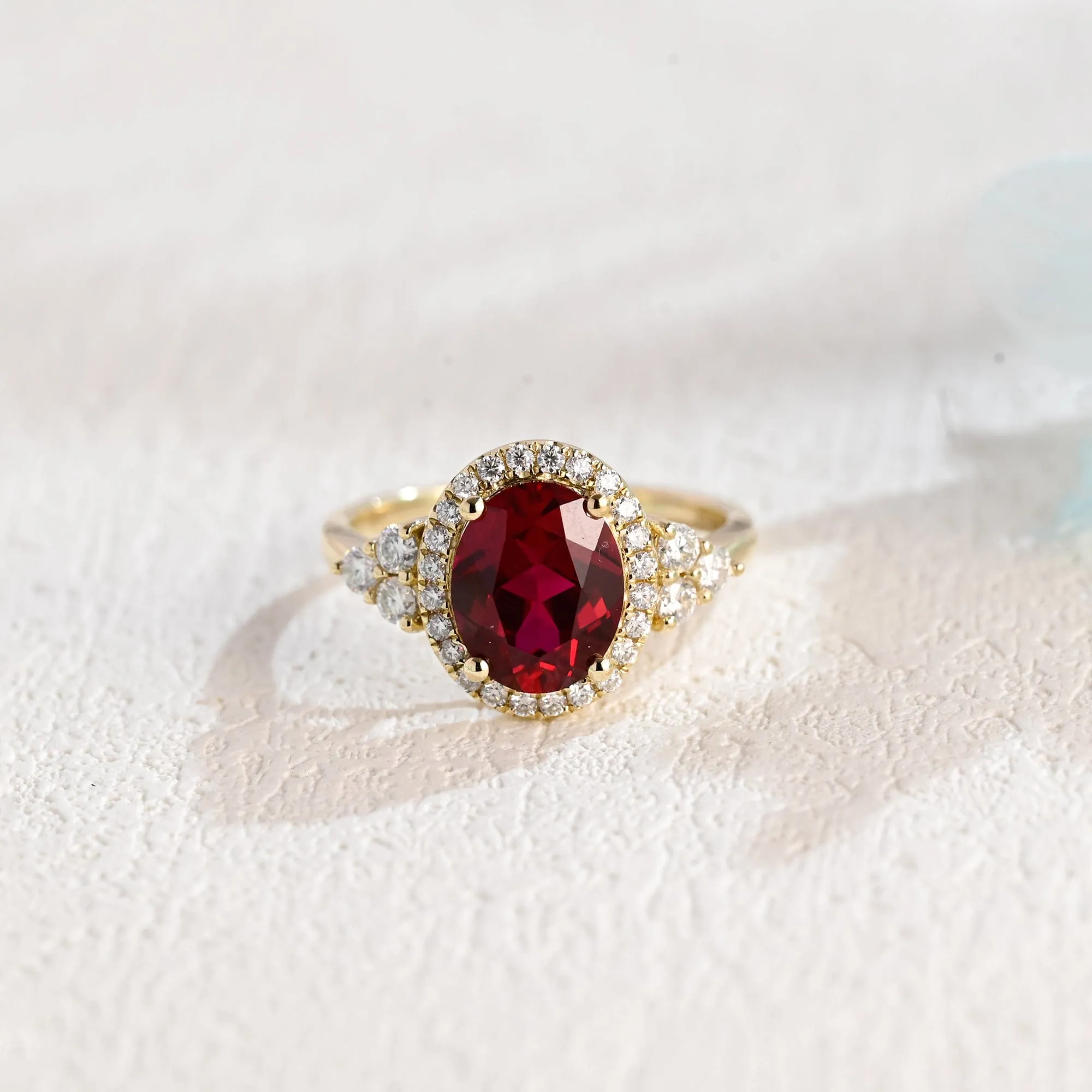 Solid Gold Trio Cluster Halo Red Oval Cut Lab Grown Ruby Engagement Ring sold by Causyou