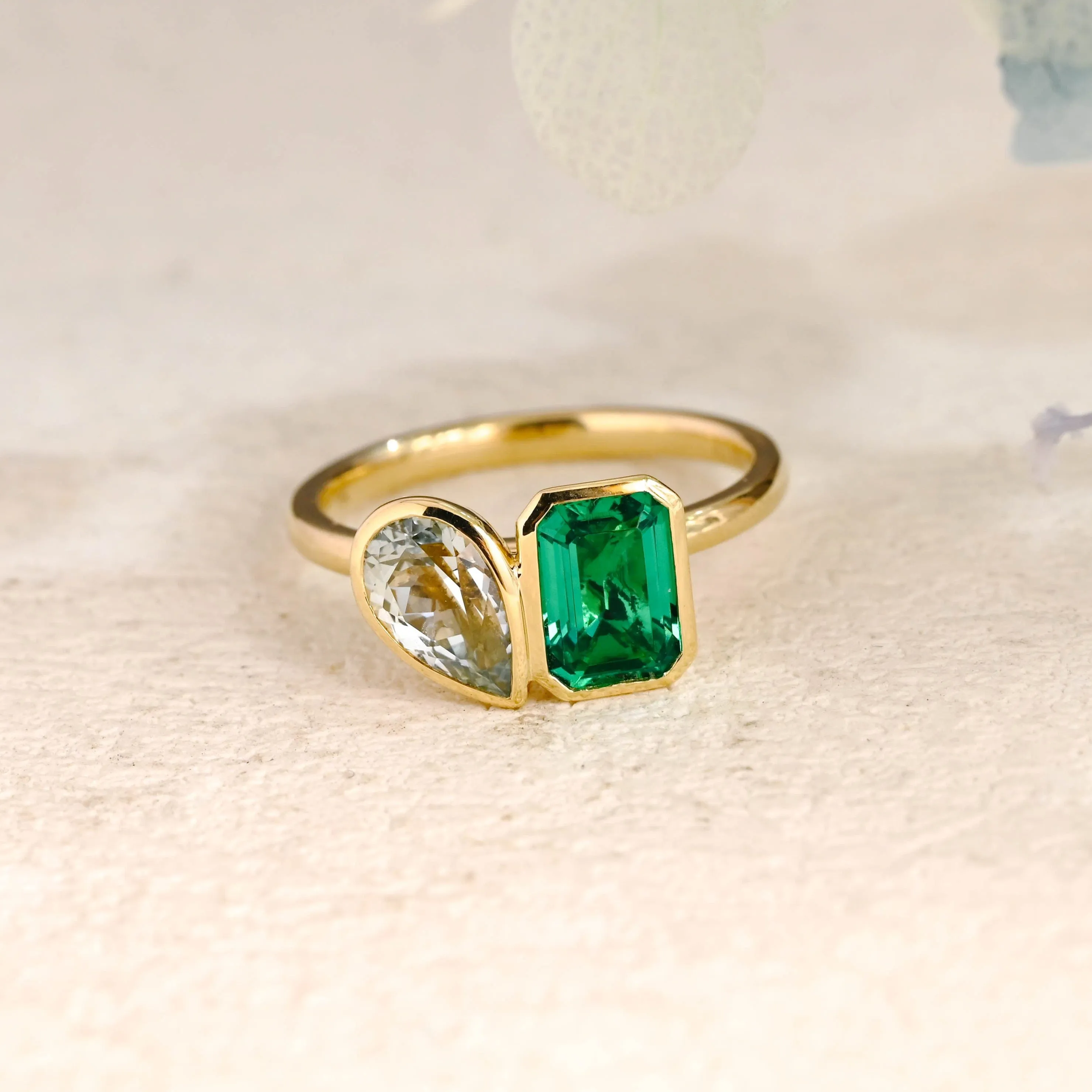 Solid Gold Toi et Moi Lab Grown Emerald & Pear Cut Aquamarine Sapphire Engagement Ring sold by Causyou