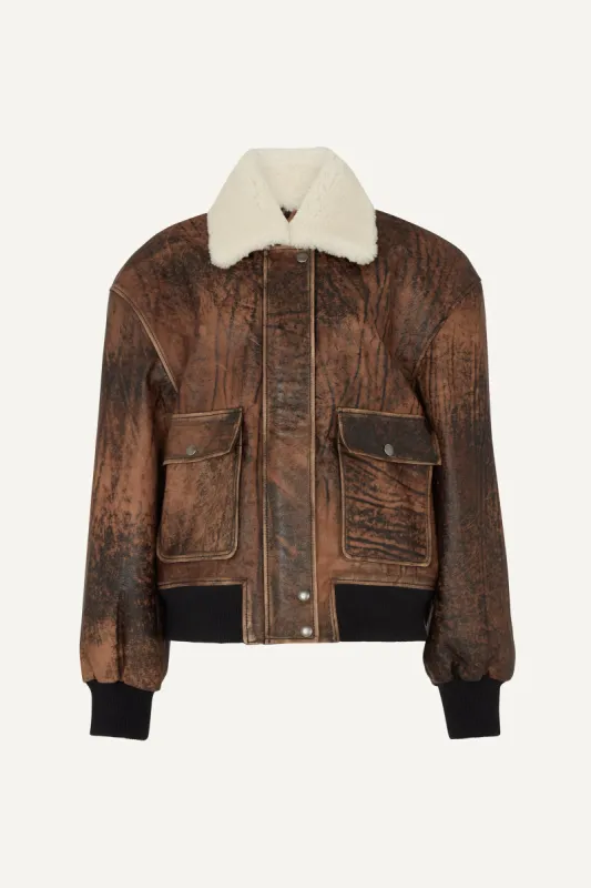 Mila Distressed Leather Bomber Jacket With Shearling Collar sold by DUCIE