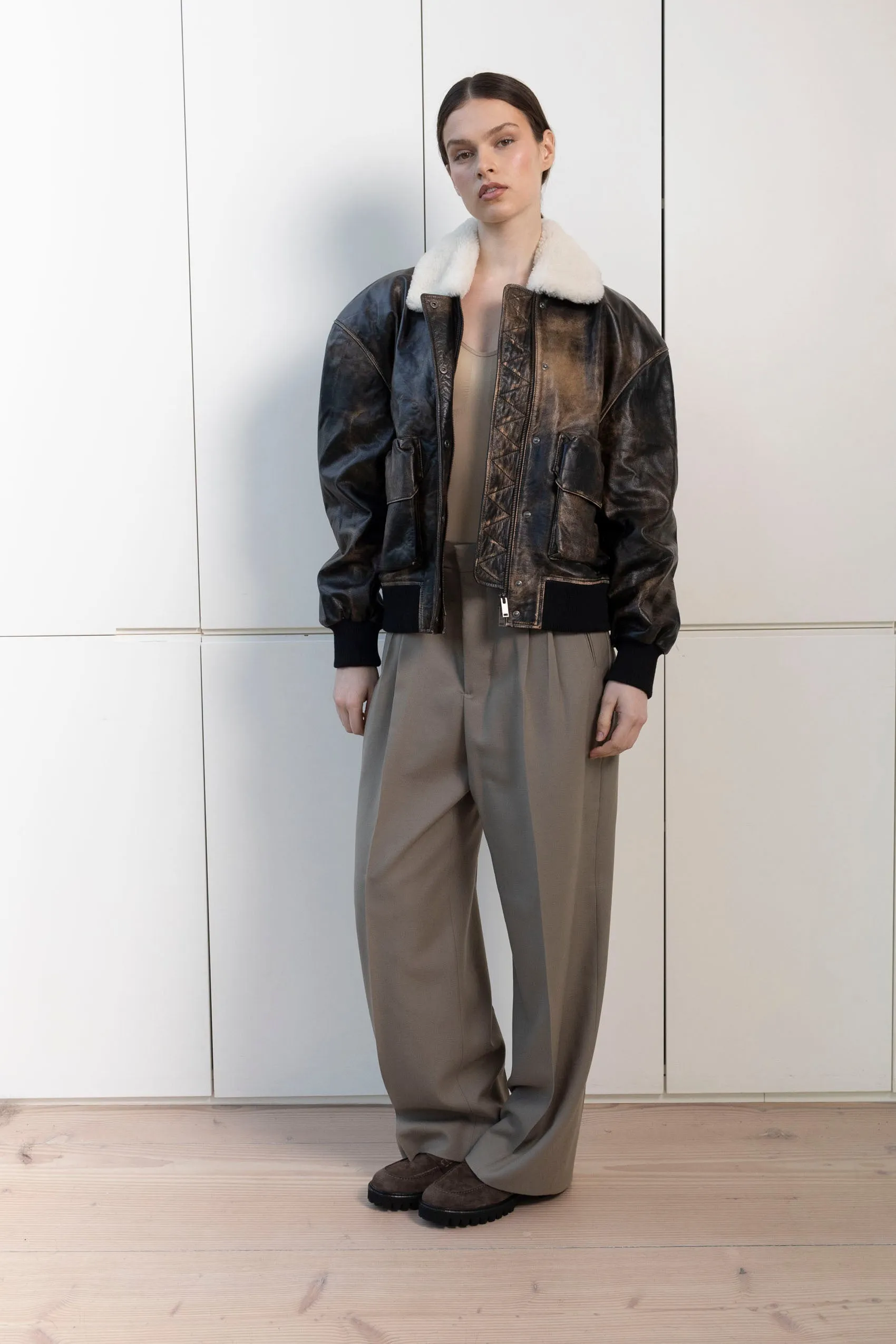 Mila Distressed Leather Bomber Jacket With Shearling Collar sold by DUCIE