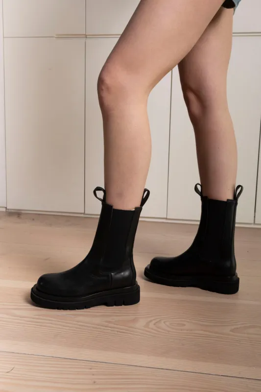 Kara Leather Boots sold by DUCIE