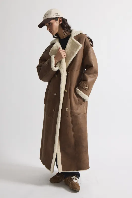 Evander Shearling Maxi Coat sold by DUCIE
