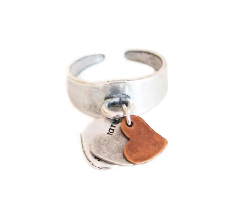 Statement ring in silver with double hearts charms sold by Maiden-Art