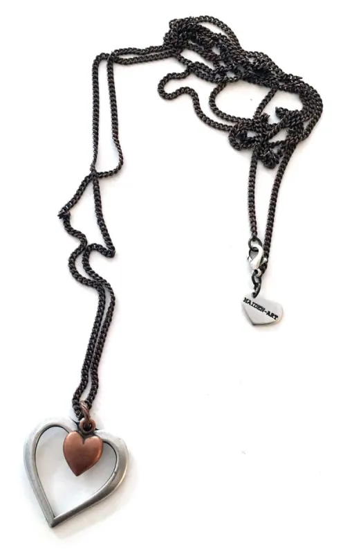 Double heart long necklace in brass and silver. Perfect for valentines day, valentines day gift, gift for her. sold by Maiden-Art