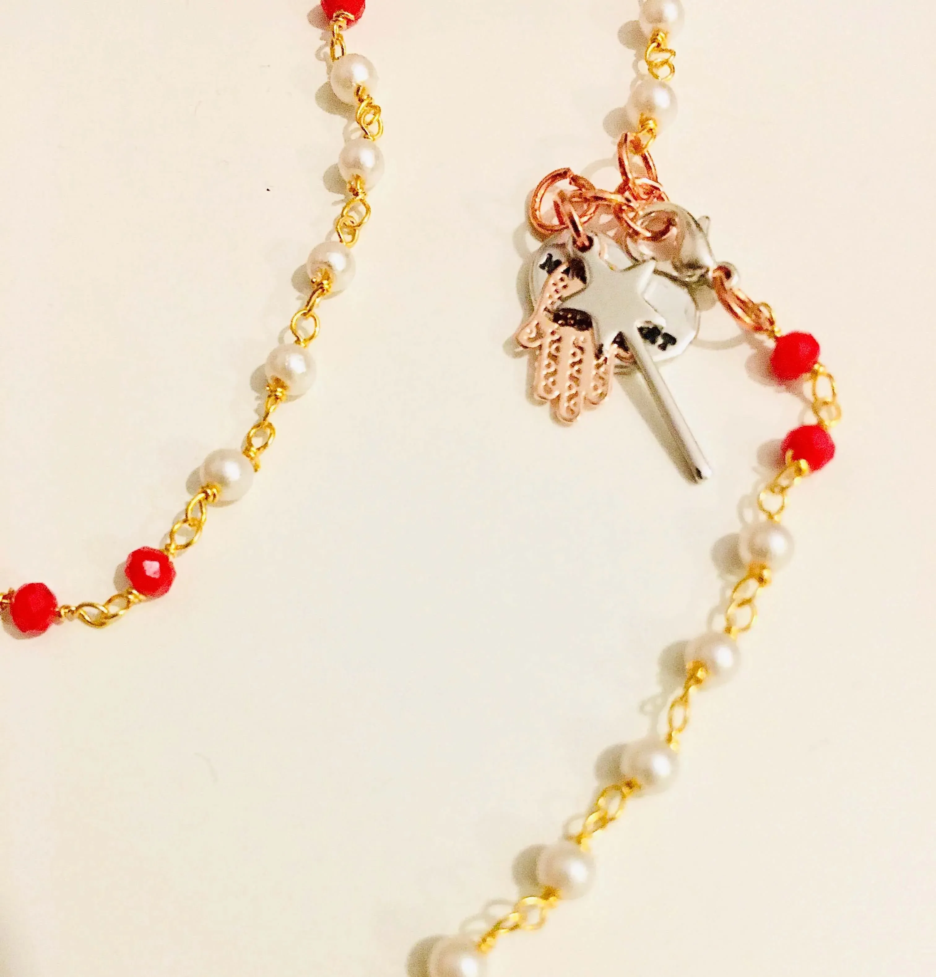 Rosary pearls and red crystals long necklace with magic wand and hamsa charms. sold by Maiden-Art product image thumbnail 3