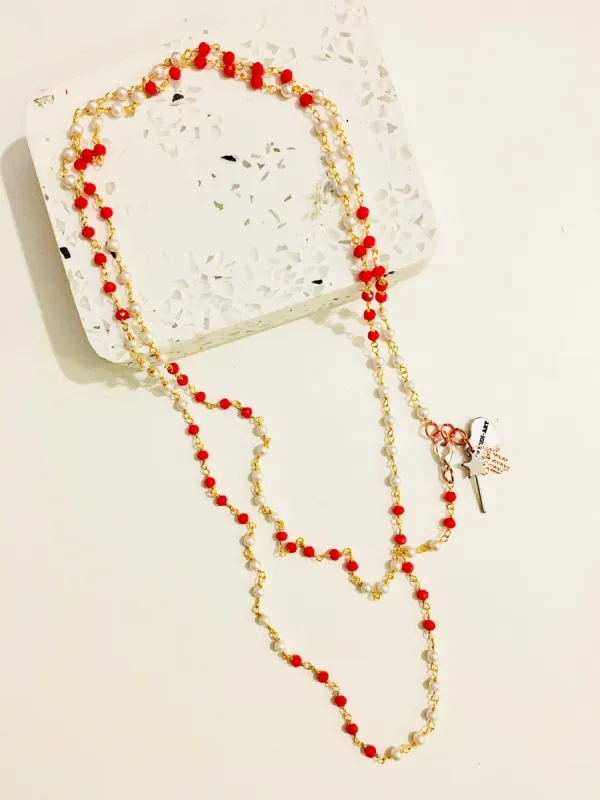 Rosary pearls and red crystals long necklace with magic wand and hamsa charms. sold by Maiden-Art