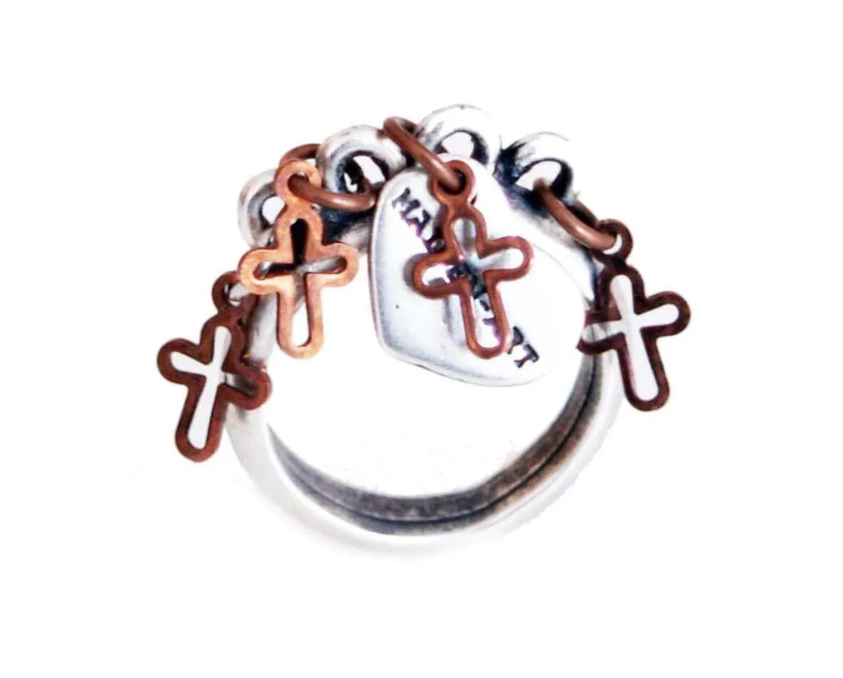 Statement ring in silver with crosses sold by Maiden-Art
