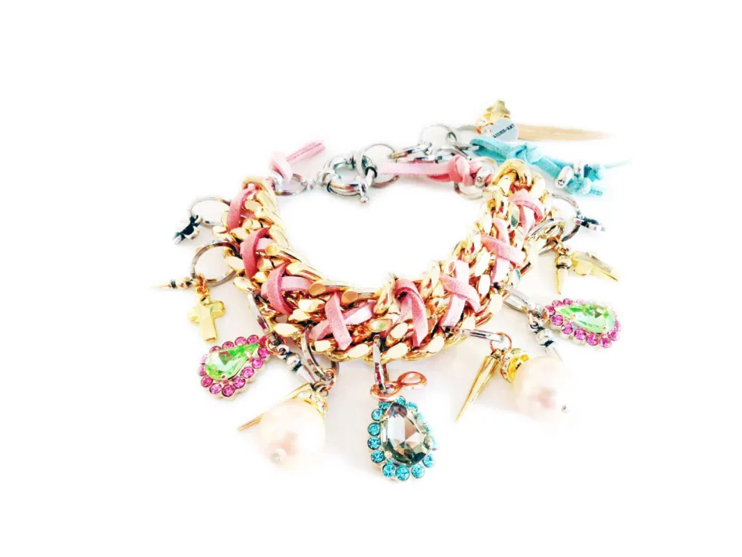 Gold chain bracelet with suede ribbon, pearls, glass beads, brass and gold charms. sold by Maiden-Art