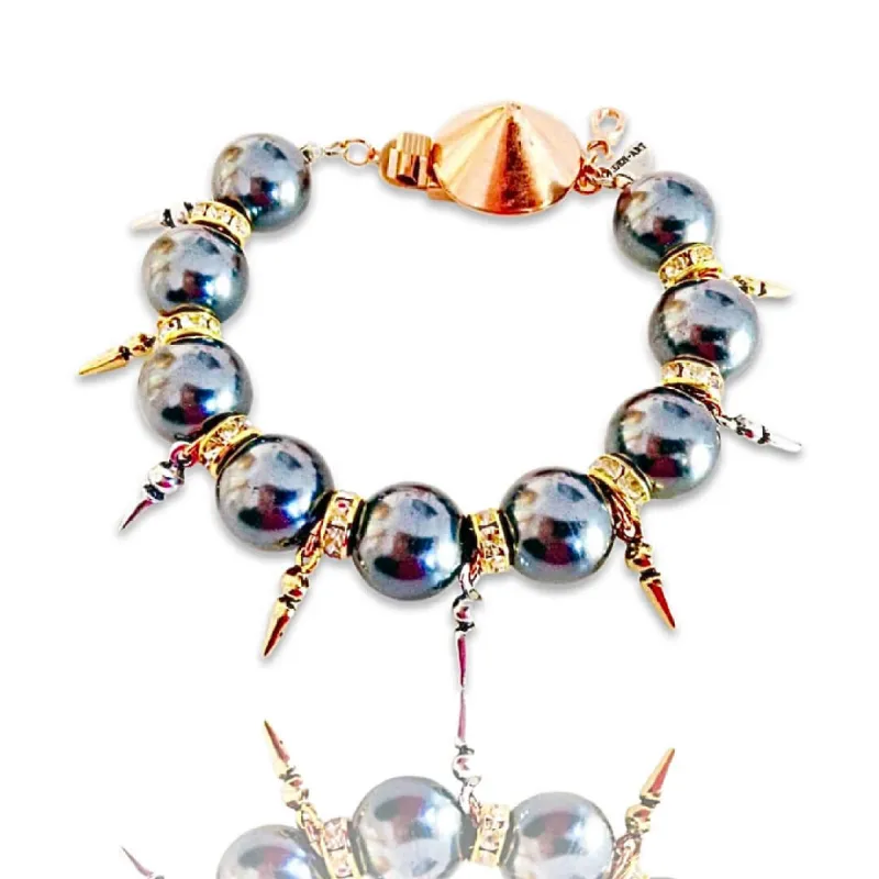Handmade statement bracelet with black pearls, Swarovski crystals, rhinestones and gold, silver, rose gold plated brass. sold by Maiden-Art