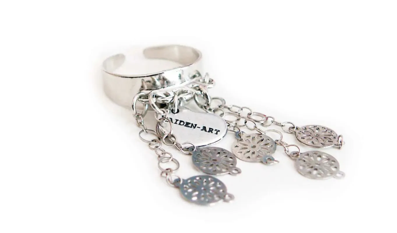 Statement ring in silver with flower fringes sold by Maiden-Art