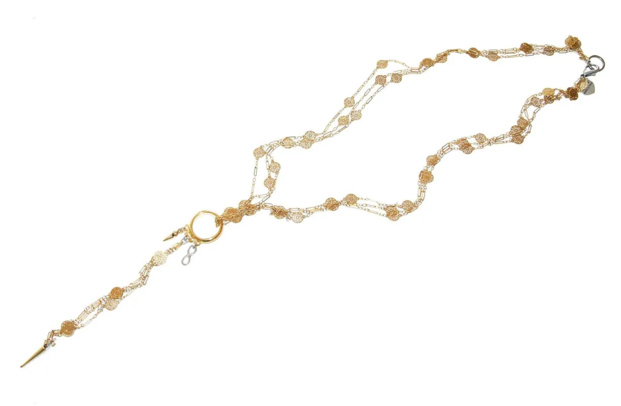 Lariat necklace with studs and gold flower chains sold by Maiden-Art