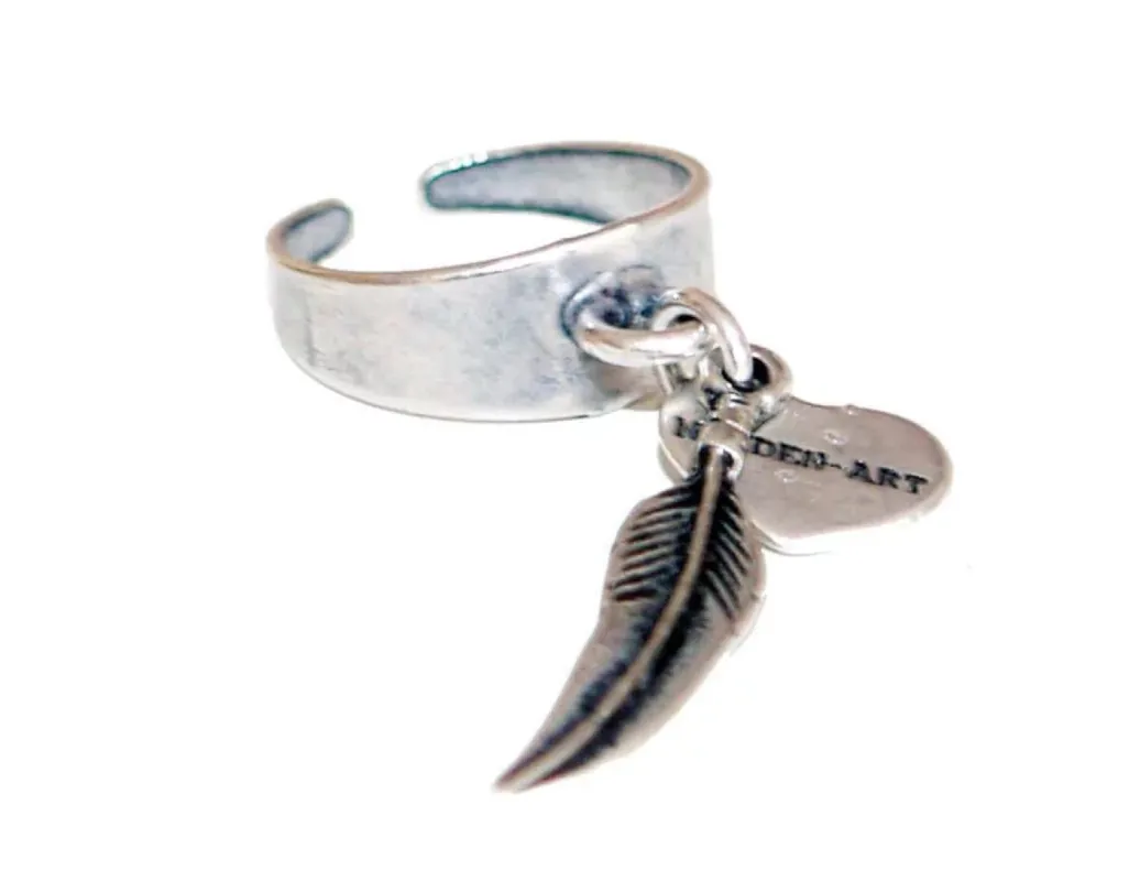 Statement ring in silver with feather charm sold by Maiden-Art