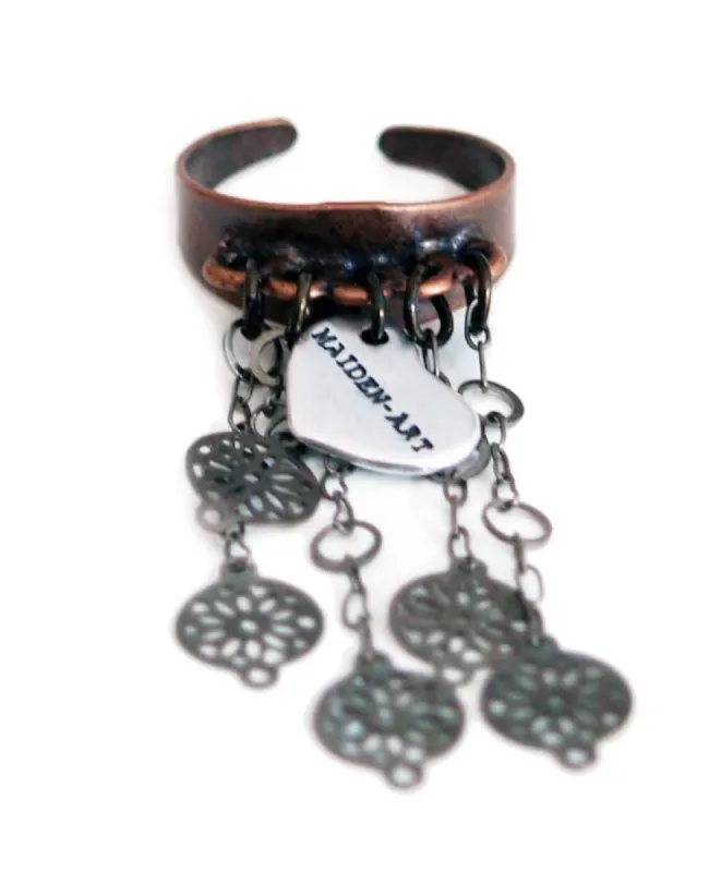Statement ring in copper with flower fringes sold by Maiden-Art