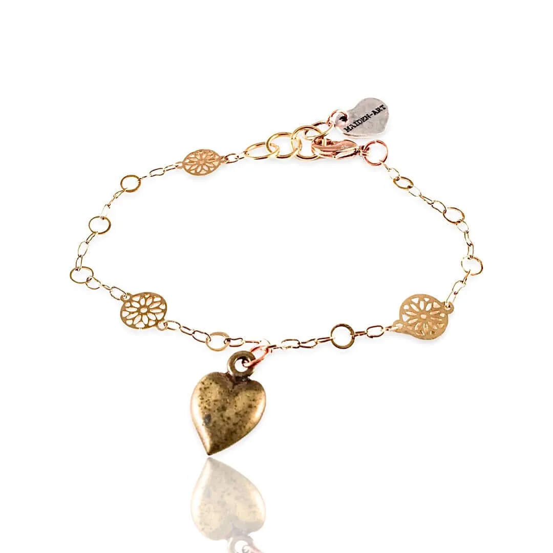 Bronze Heart Charm Bracelet and 18kt Gold Plated Flower Chain. sold by Maiden-Art