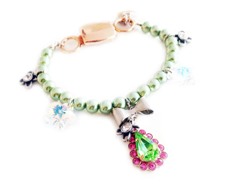 Light green beaded bracelet with pink and green rhinestones. sold by Maiden-Art