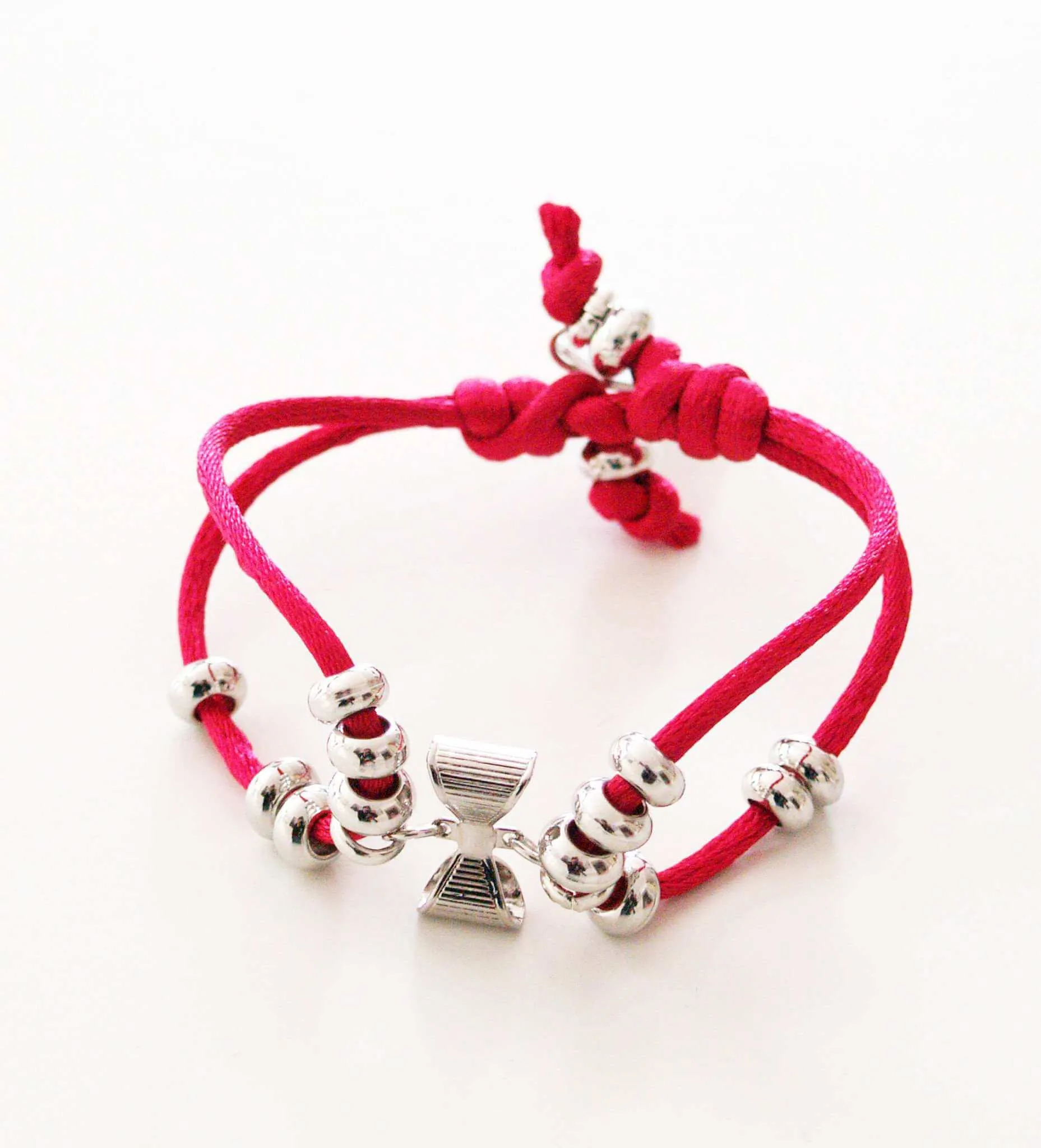 Friendship bracelet with colorful silk cord and a small bow. sold by Maiden-Art product image thumbnail 2