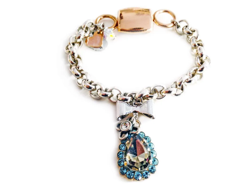 Chain and link bracelet with light blue Crystals crystals and silver, rose gold plated brass. sold by Maiden-Art