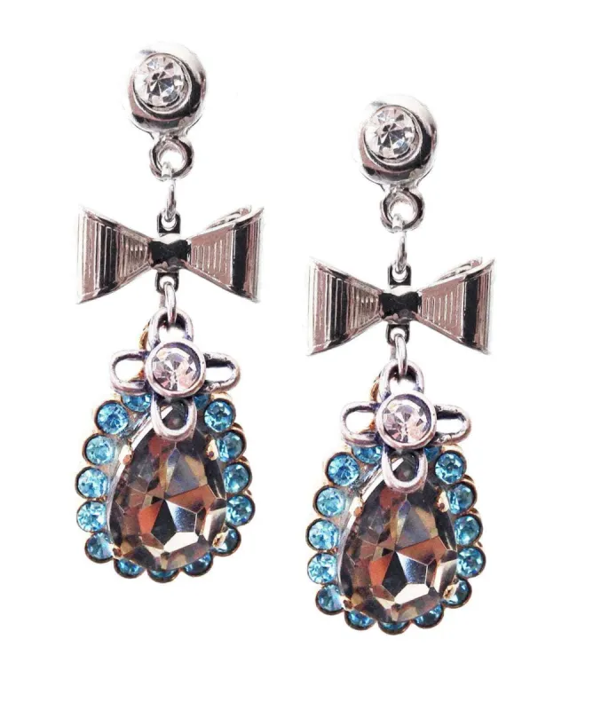 Light blue dangle and drop earrings made with Crystallized Swarovski elements and silver plated brass and small charms. sold by Maiden-Art