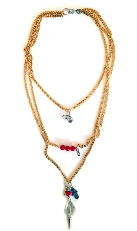 Layered necklace in gold, coral and hamsa. sold by Maiden-Art
