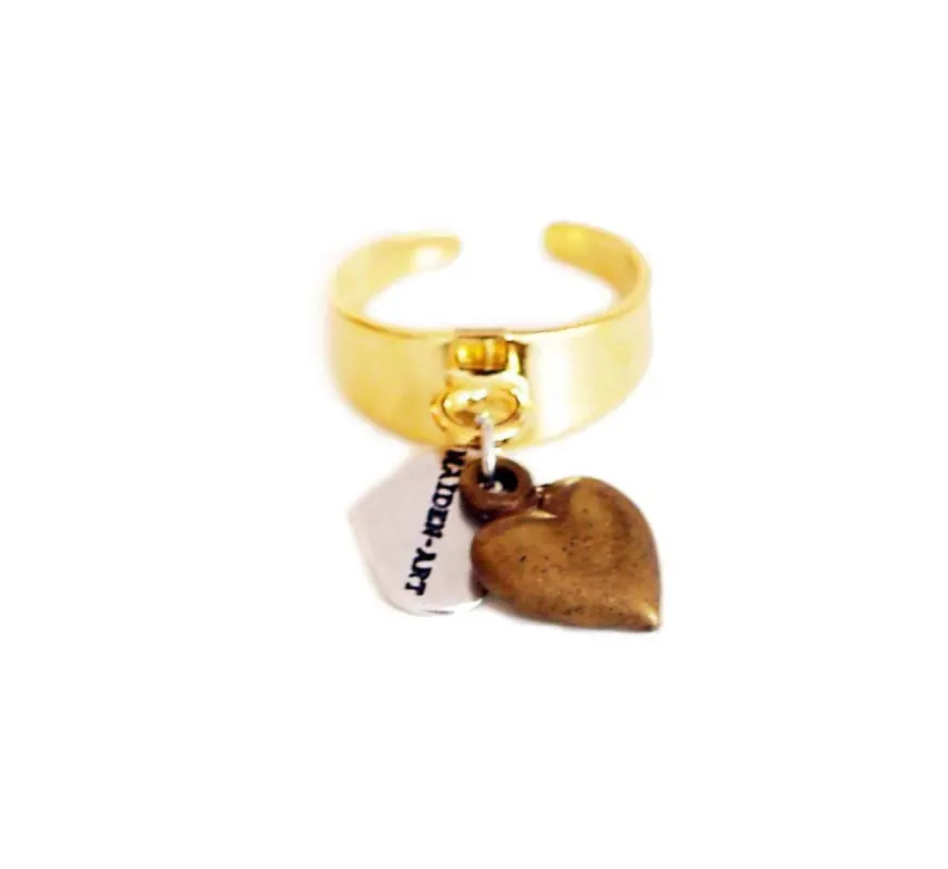 Statement ring in gold with bronze heart charm sold by Maiden-Art