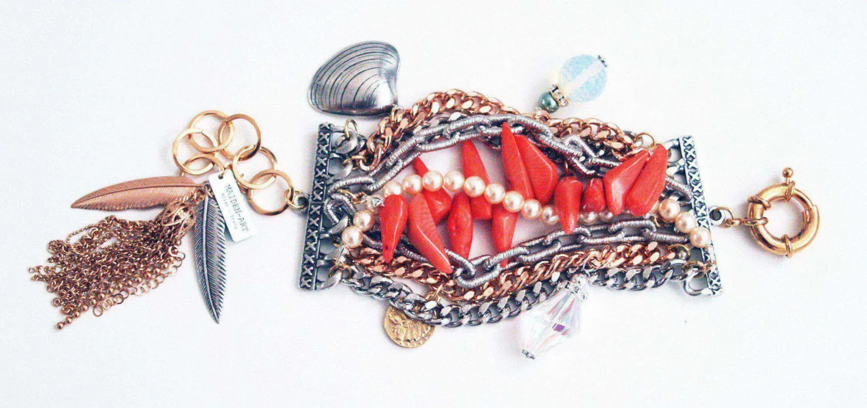 Silver cuff bracelet with crystals, pearls, charms and natural coral. sold by Maiden-Art