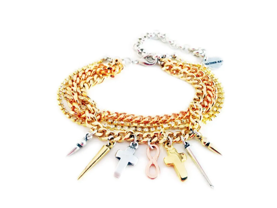 Handmade cuff bracelet with Swarovski crystals, charms and rhinestones and gold, silver, rose gold plated brass. sold by Maiden-Art