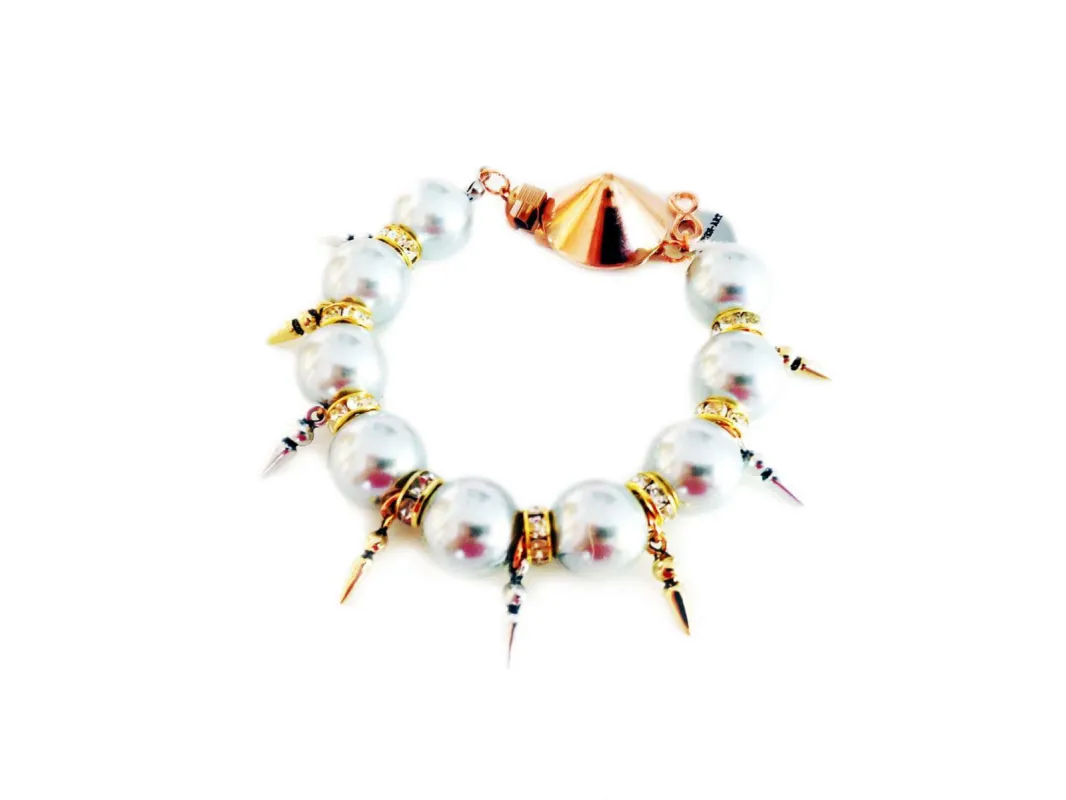 Handmade statement bracelet with light blue pearls, Swarovski crystals, rhinestones and gold, silver, rose gold plated brass. sold by Maiden-Art