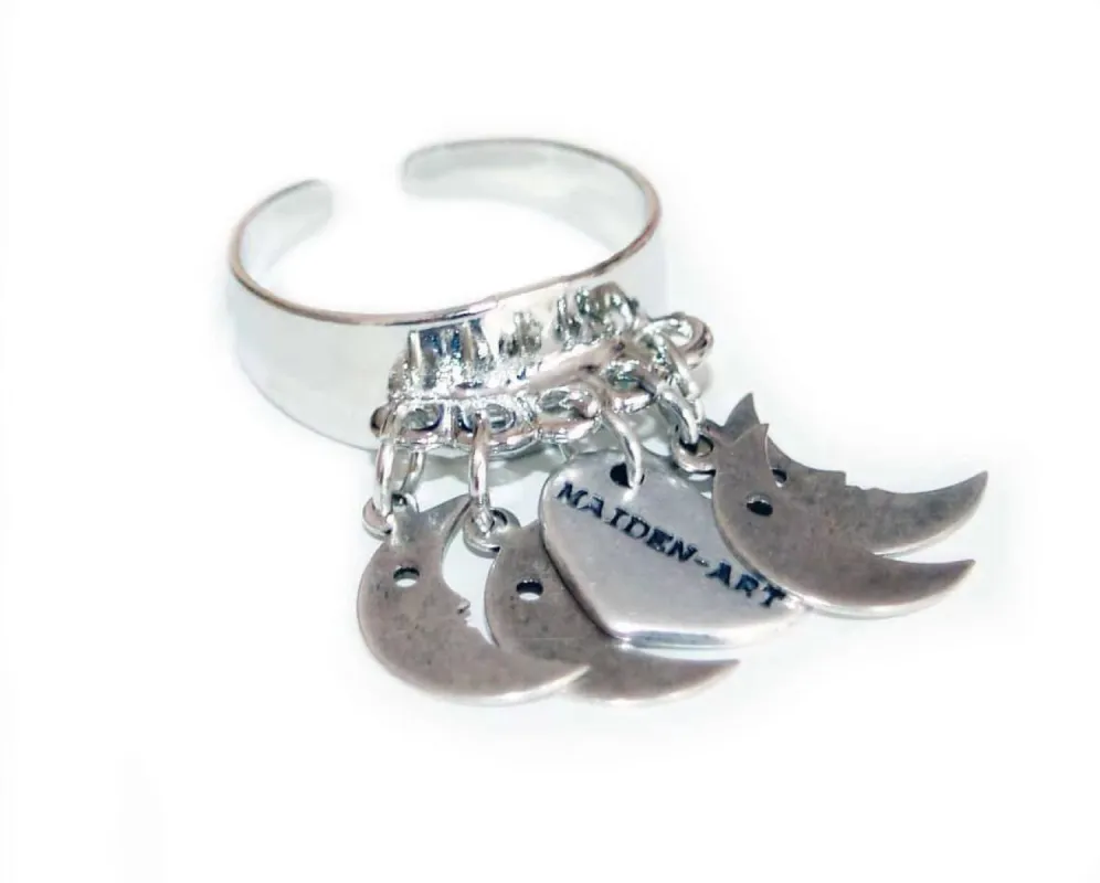 Statement ring in silver with moon charms sold by Maiden-Art
