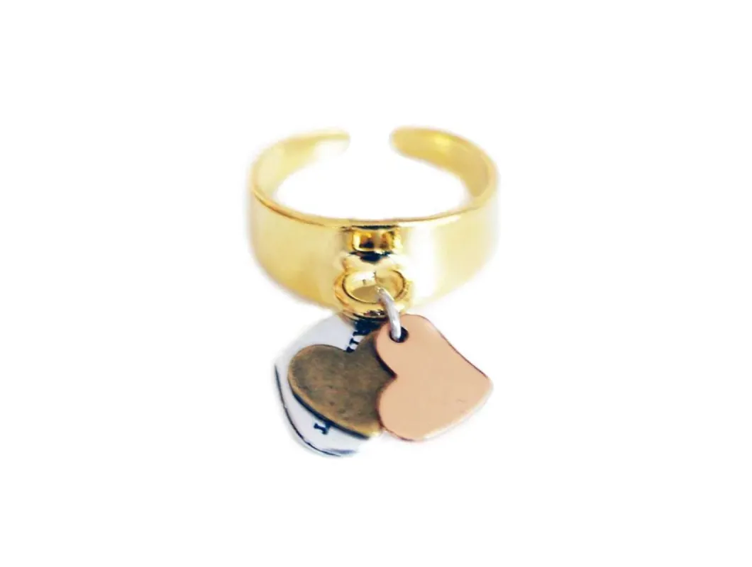 Statement ring in gold with double hearts charms sold by Maiden-Art