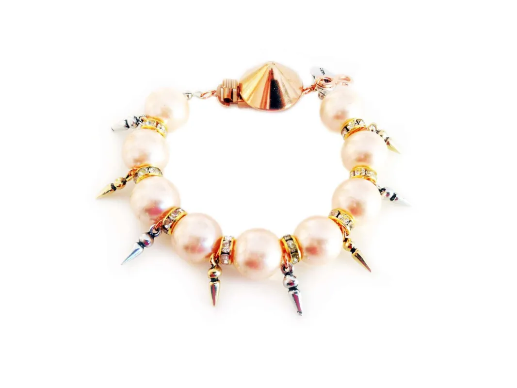 Handmade statement bracelet with light rose pearls, Swarovski crystals, rhinestones and gold, silver, rose gold plated brass. sold by Maiden-Art