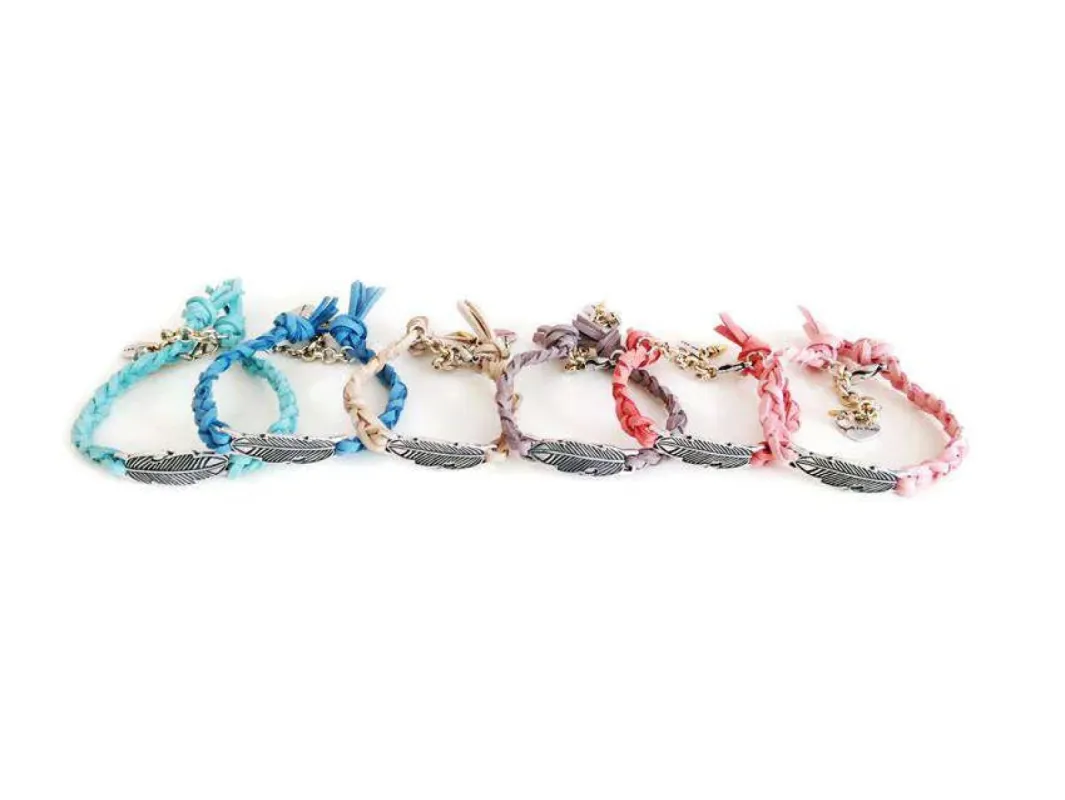 Woven and braided Bracelets with feather and suede leather in 6 colors. sold by Maiden-Art