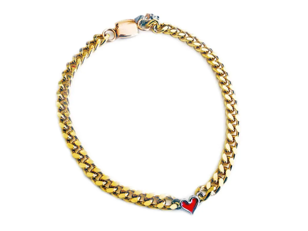 Gold chain necklace with red heart shaped charm. sold by Maiden-Art