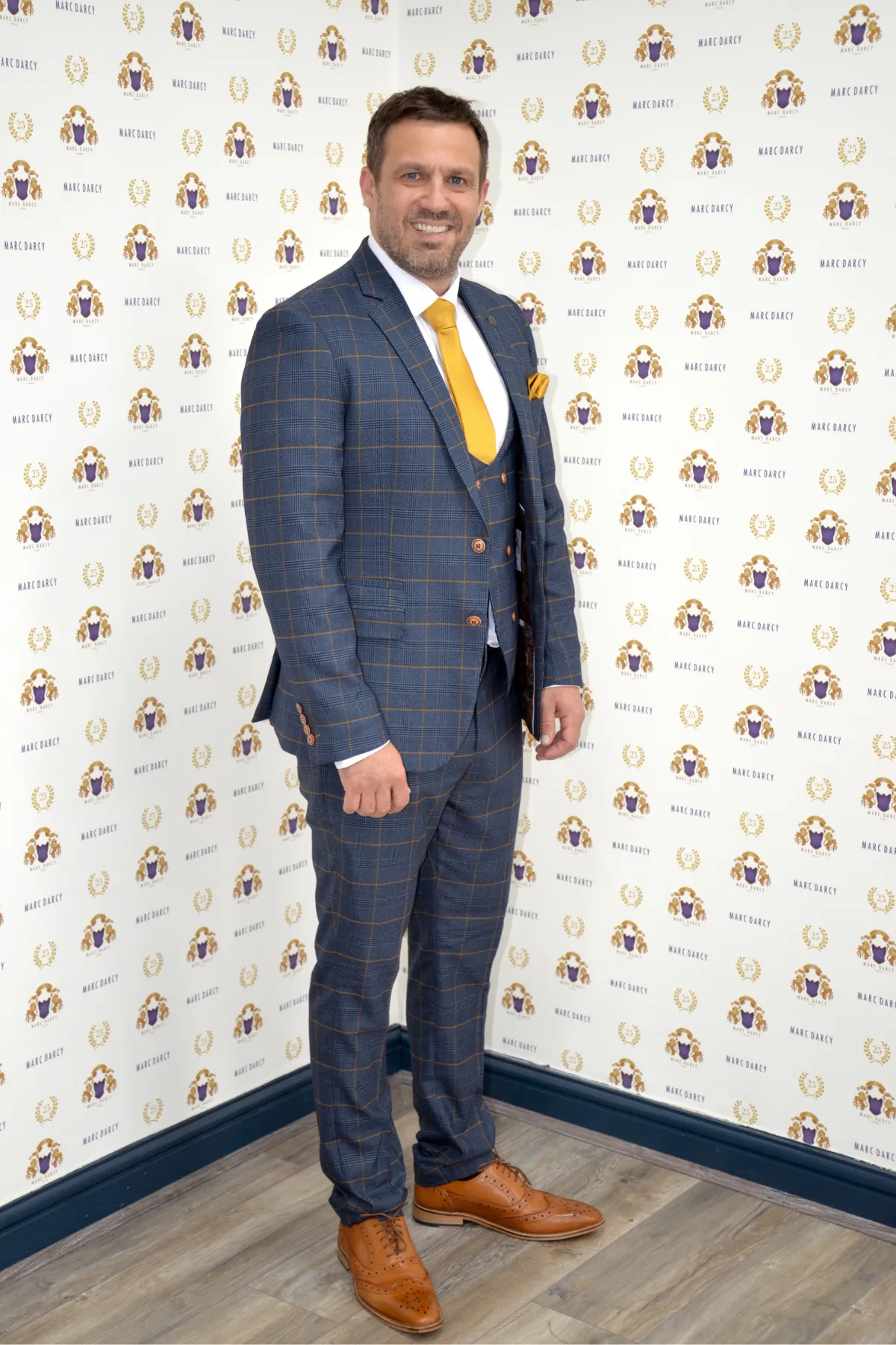 Actor Jamie Lomas in Jenson Marine Check Suit sold by Marc Darcy