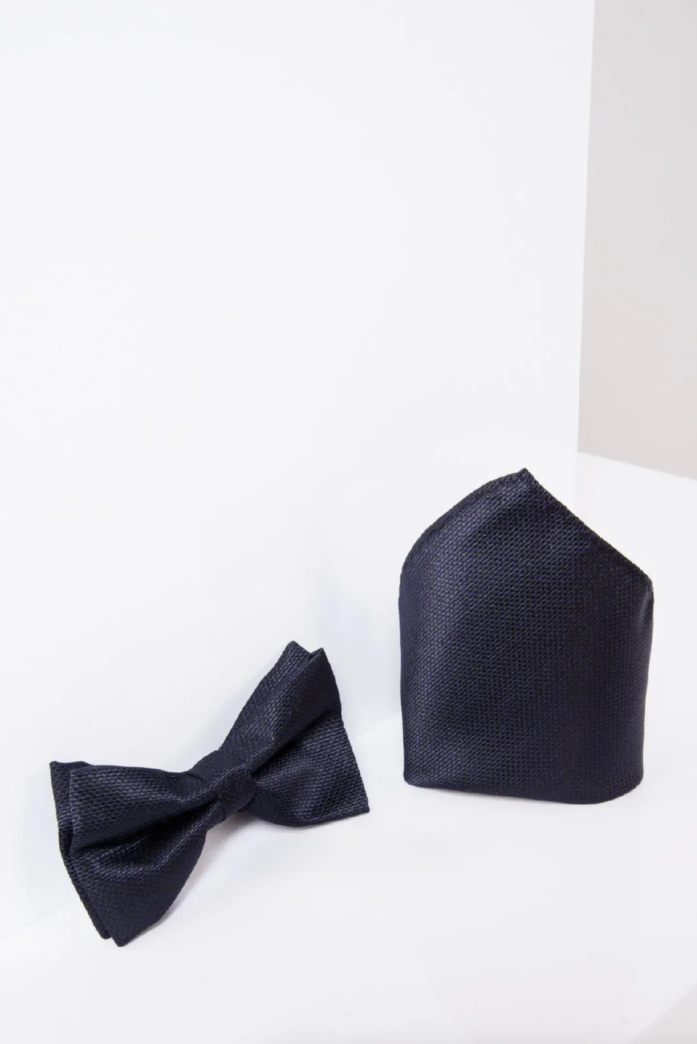 TB17 - Birdseye Print Bow Tie and Pocket Square Set In Midnight sold by Marc Darcy