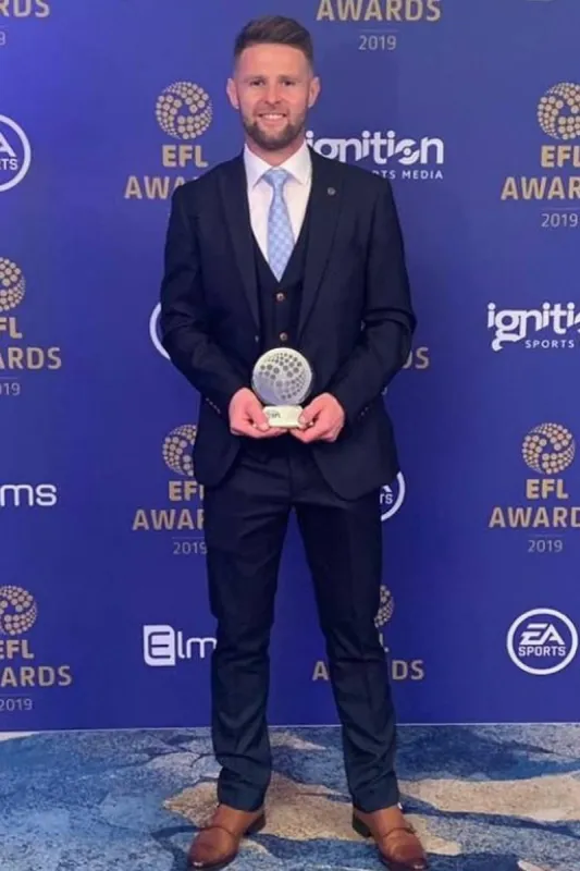 Stockport County Midfielder Oliver Norwood in Max Navy Suit sold by Marc Darcy